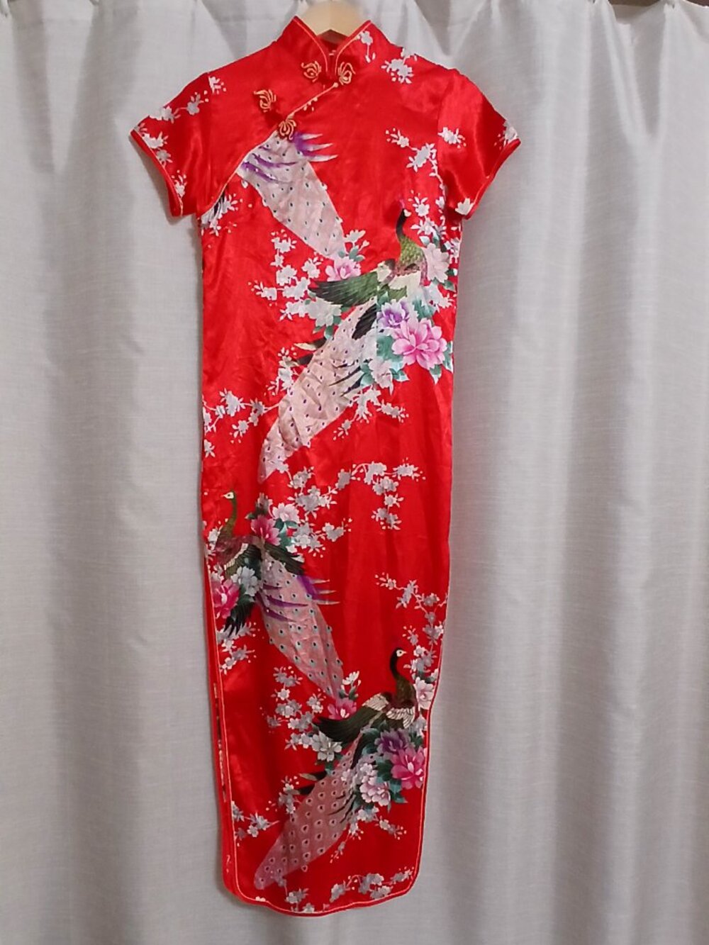 Red silk dress with peacock and floral design